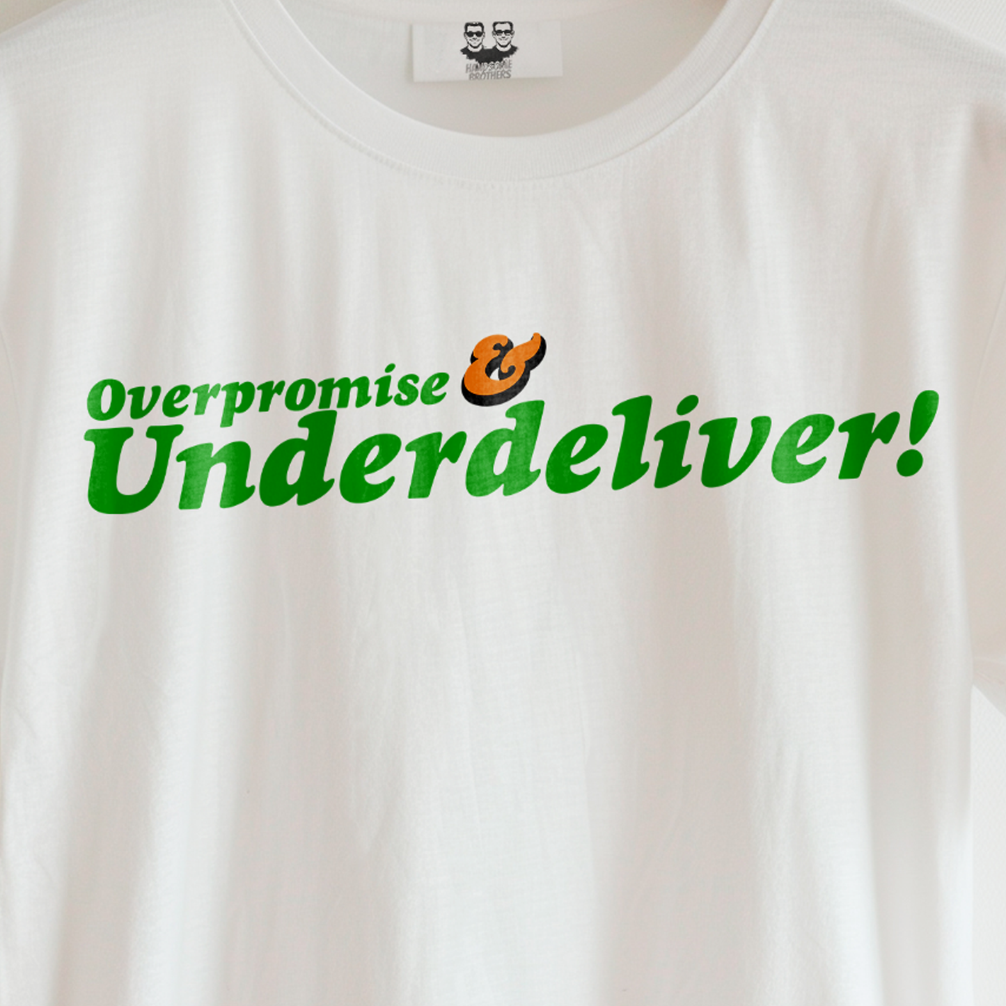 OVERPROMISE & UNDERDELIVER  (Unisex Tee) | Don't Care Flexwear